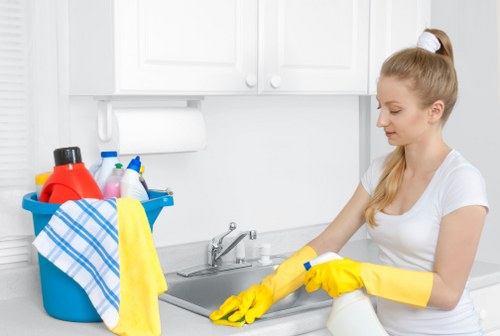 Cleaning a corner sofa and armchair in a West London home